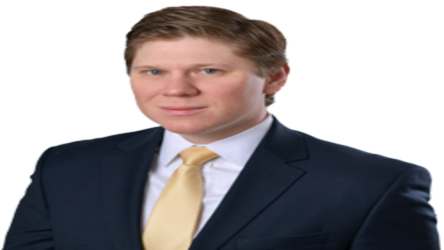 Adam K. Strider